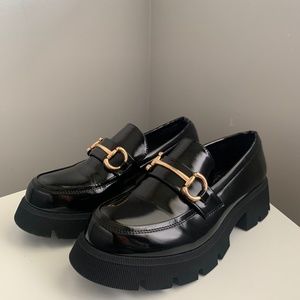 Black loafers